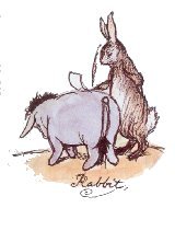 Rabbit signing his name on Eeyore's back